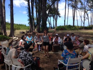 Dani facilitating drum circle in Hawaii